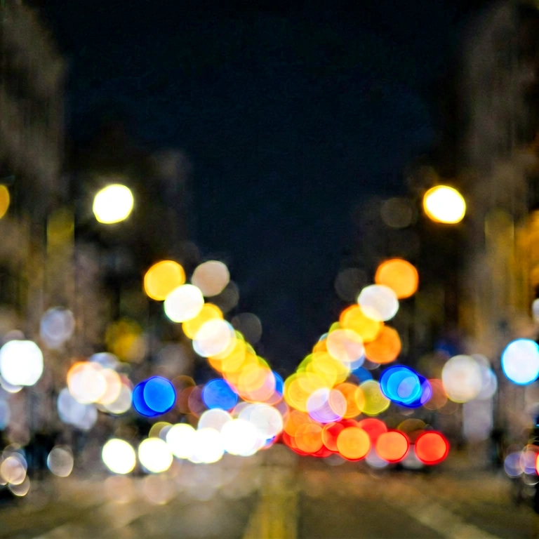 Neutral city lights bokeh - bokeh backgrounds free stock photo