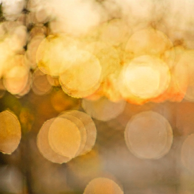 Neutral warm light bokeh - bokeh backgrounds free stock photo